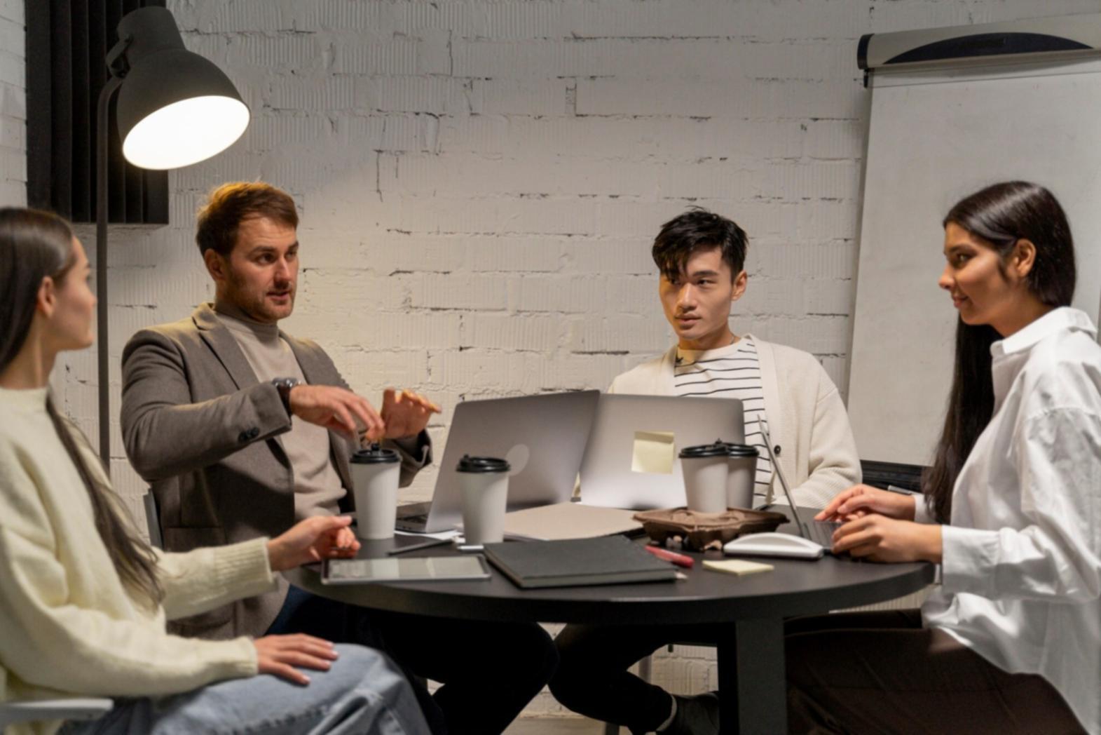 Financial analysis workspace with multiple monitors displaying market data and financial charts